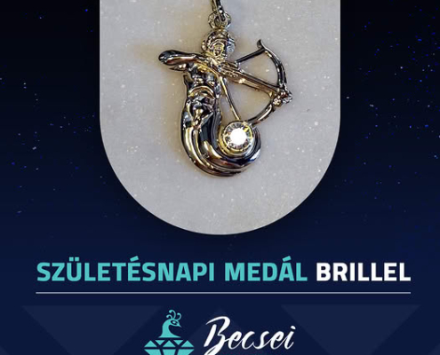 Ezüst medál brillel