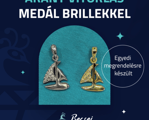 Arany vitorlás medál brillekkel